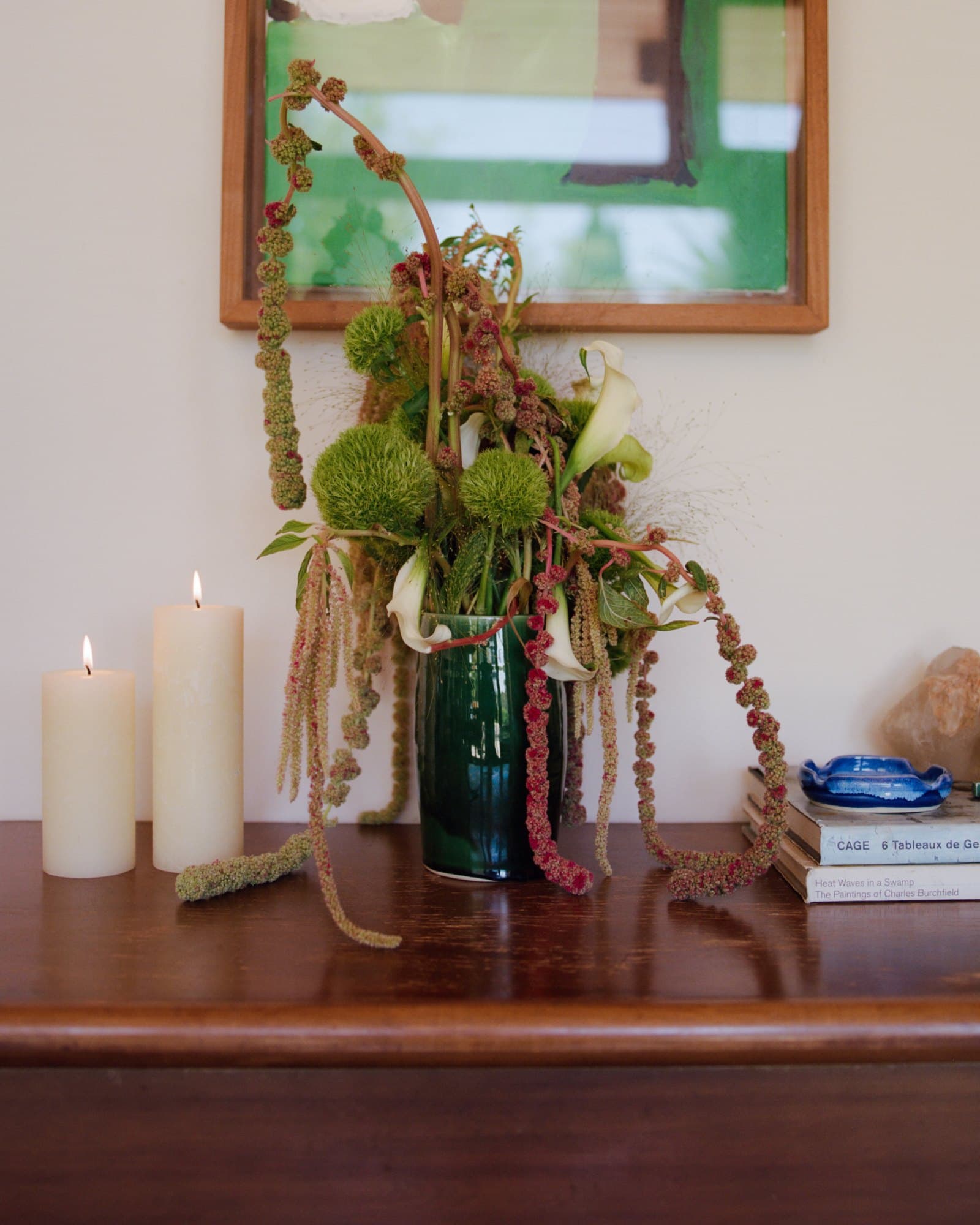 Flowers in a Studio Nia vase on a wooden console