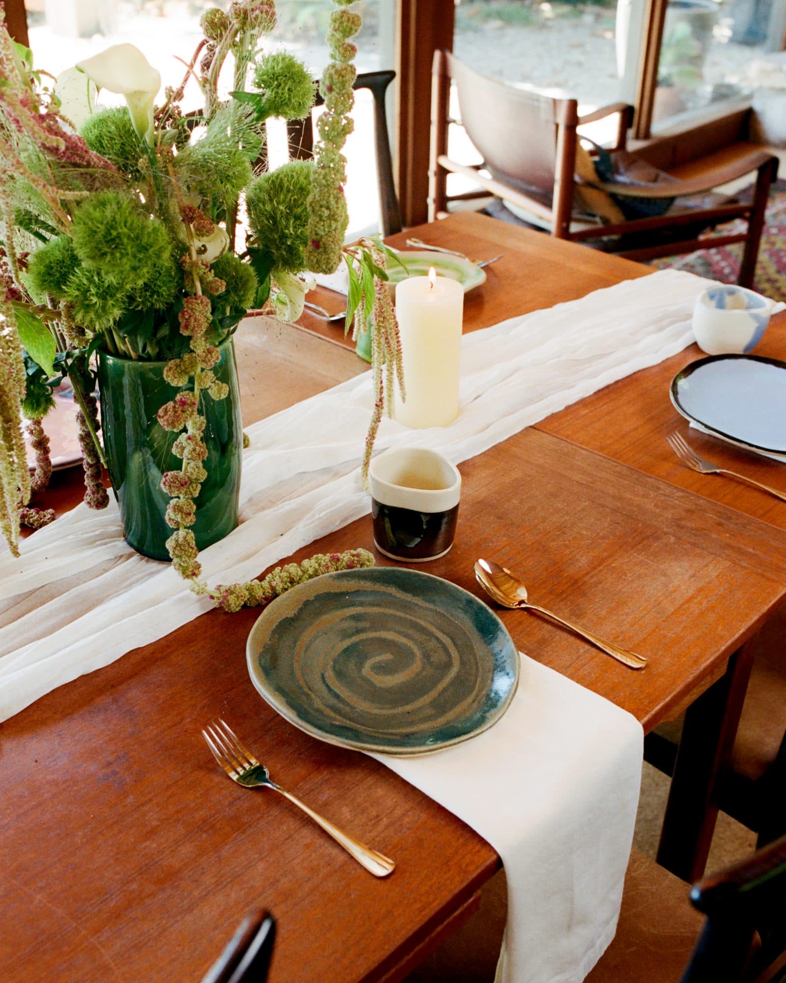 A place setting with a swirled Studio Nia plate and cup